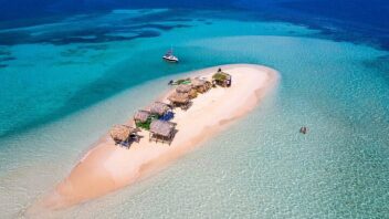 Paradise Island kiteboarding in Punta Rucia Dominican Republic with turquoise water and white sand beach